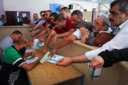 Arabs seeking permits to cross into Egypt through the Rafah border crossing, Sept. 4, 2016.