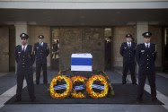 The coffin of Israel's ninth President, Shimon Peres, rests before the Knesset, accompanied by the Knesset Honor Guard.