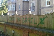 A fence with anti-Israeli graffiti in London in 2014.